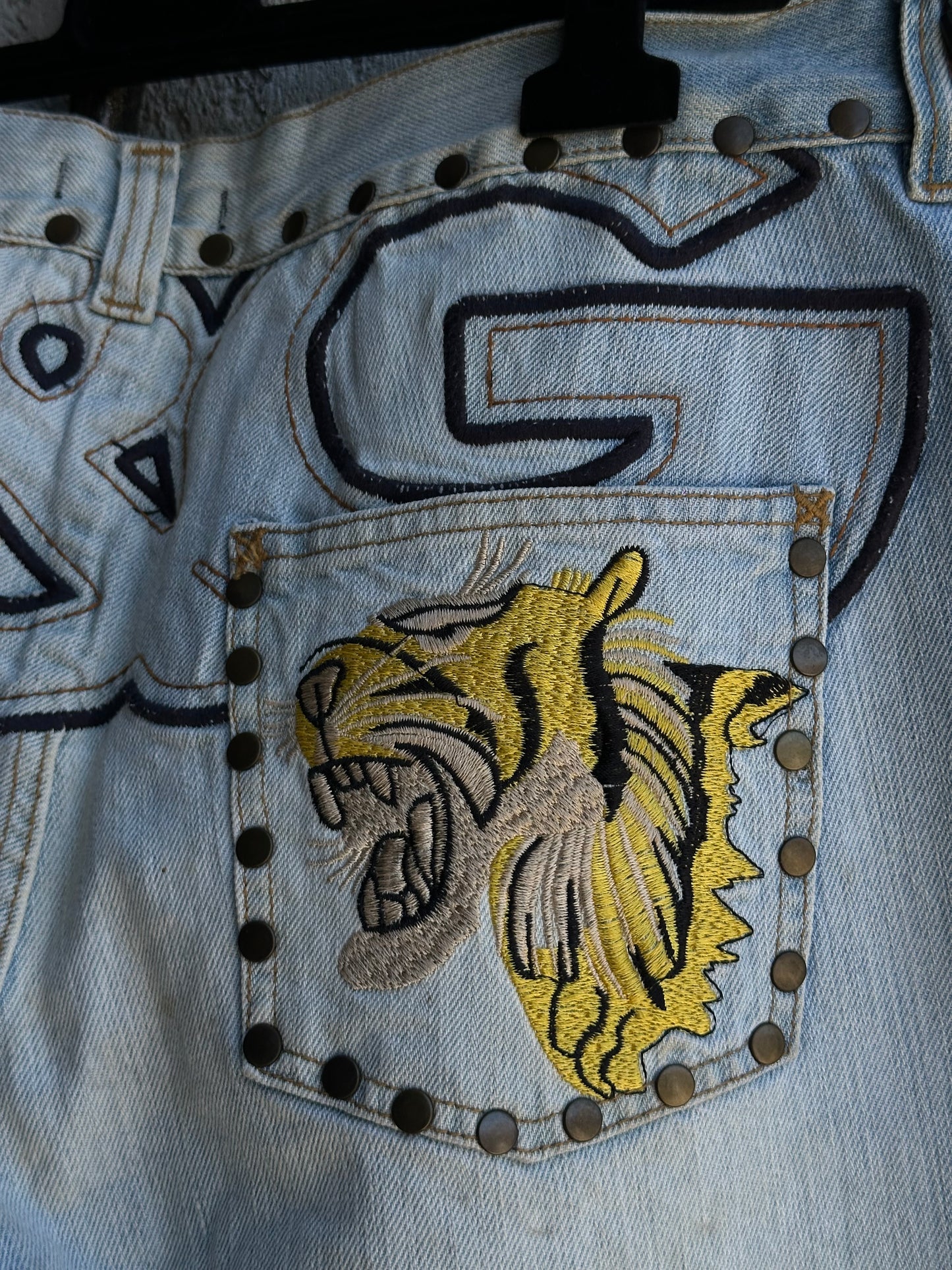 DOLCE & GABBANA TIGER STUDDED JEANS