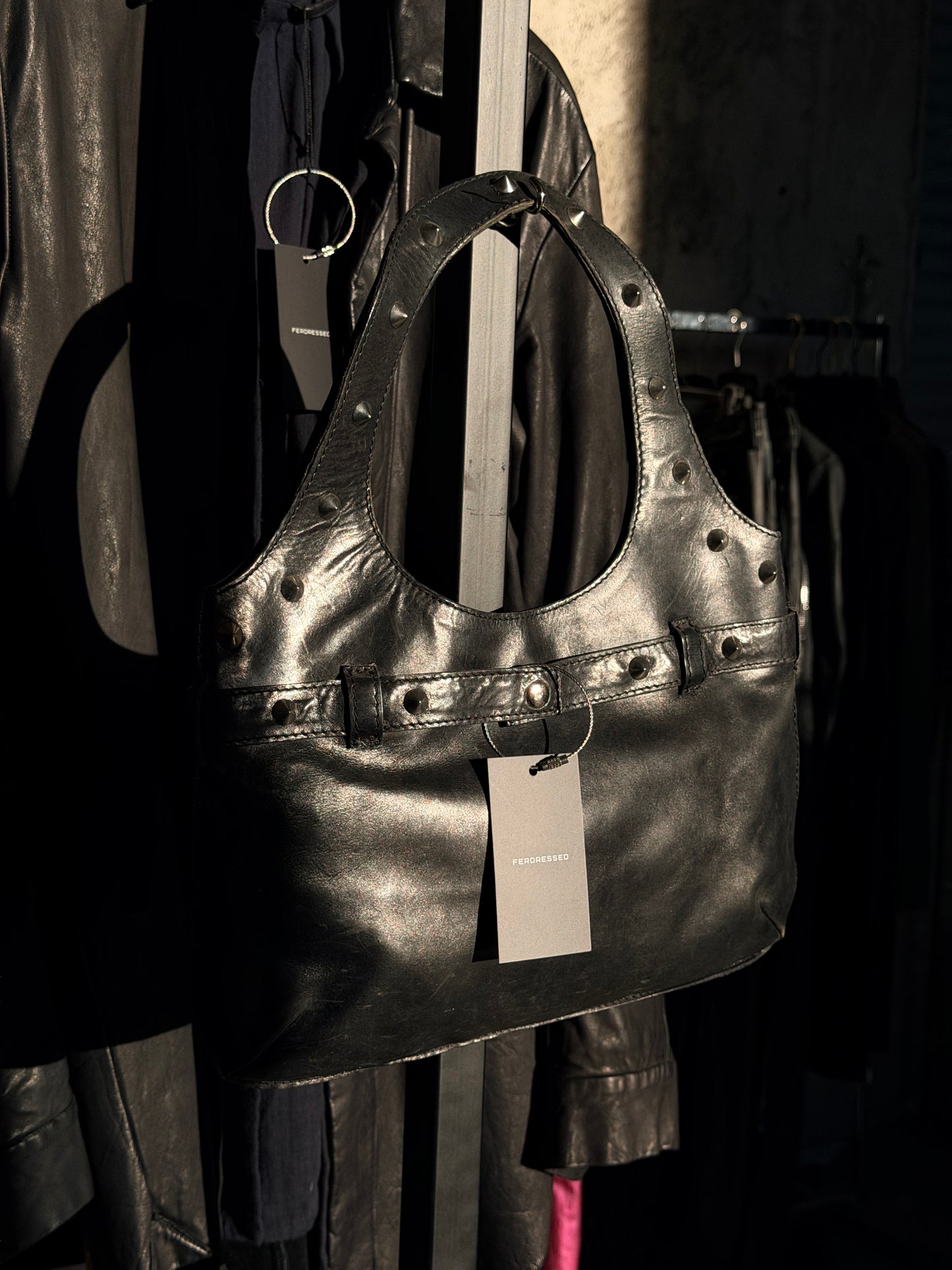 STRUCTURED STUDDED LEATHER BAG