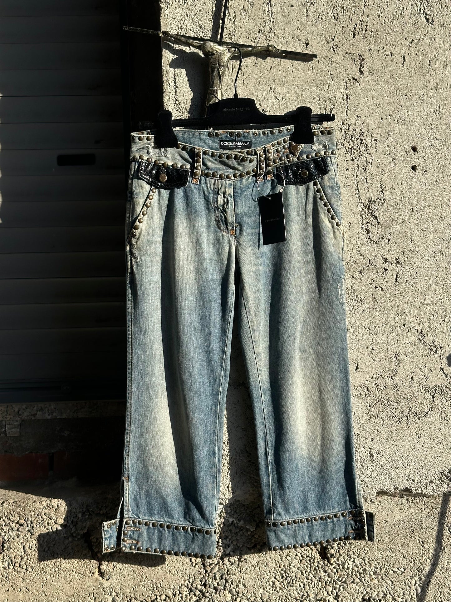 DOLCE & GABBANA DENIM AND LEATHER STUDDED CAPRI
