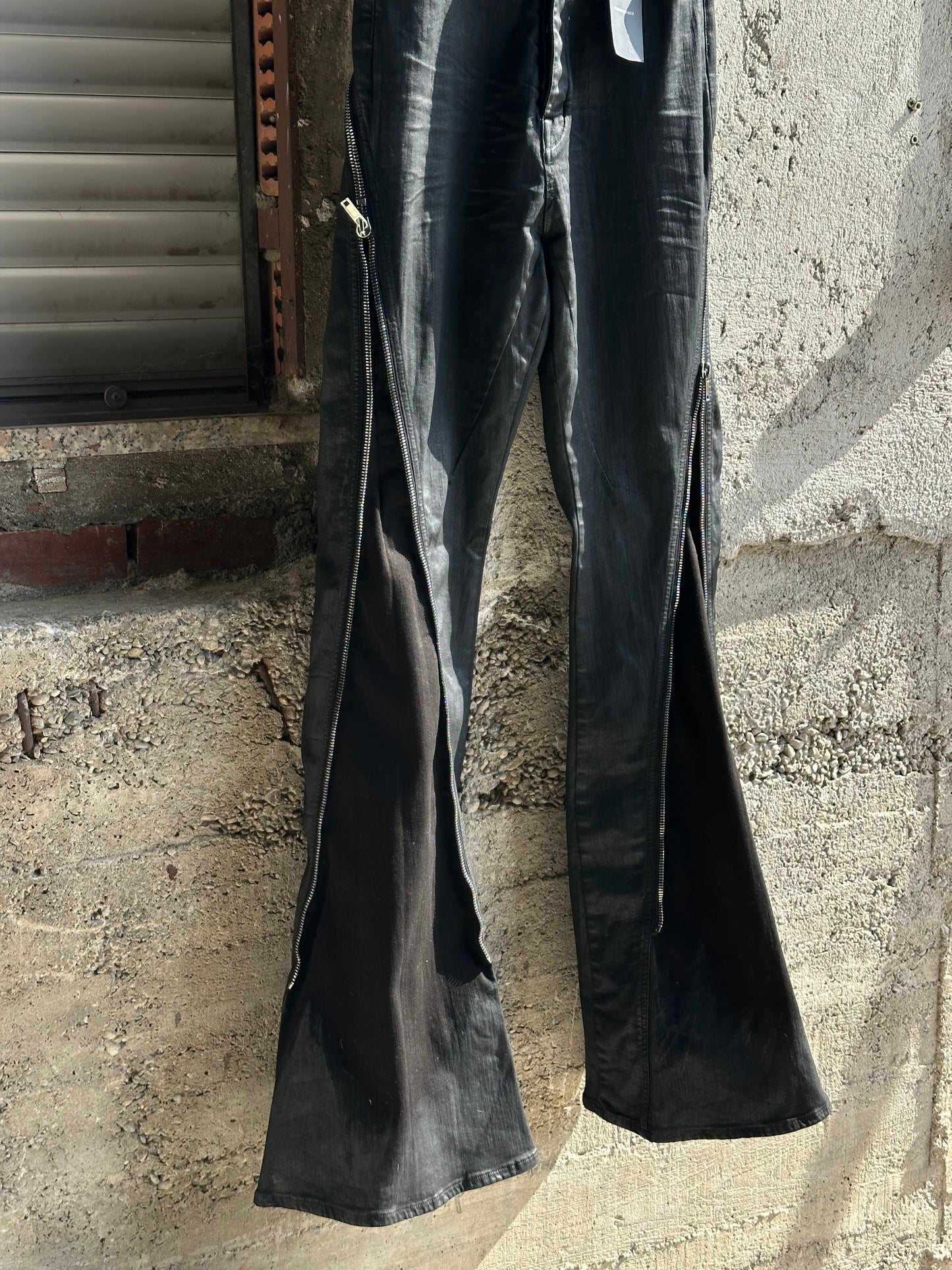 ZIPPED BOLAN WAXED DENIM BLACK PANTS