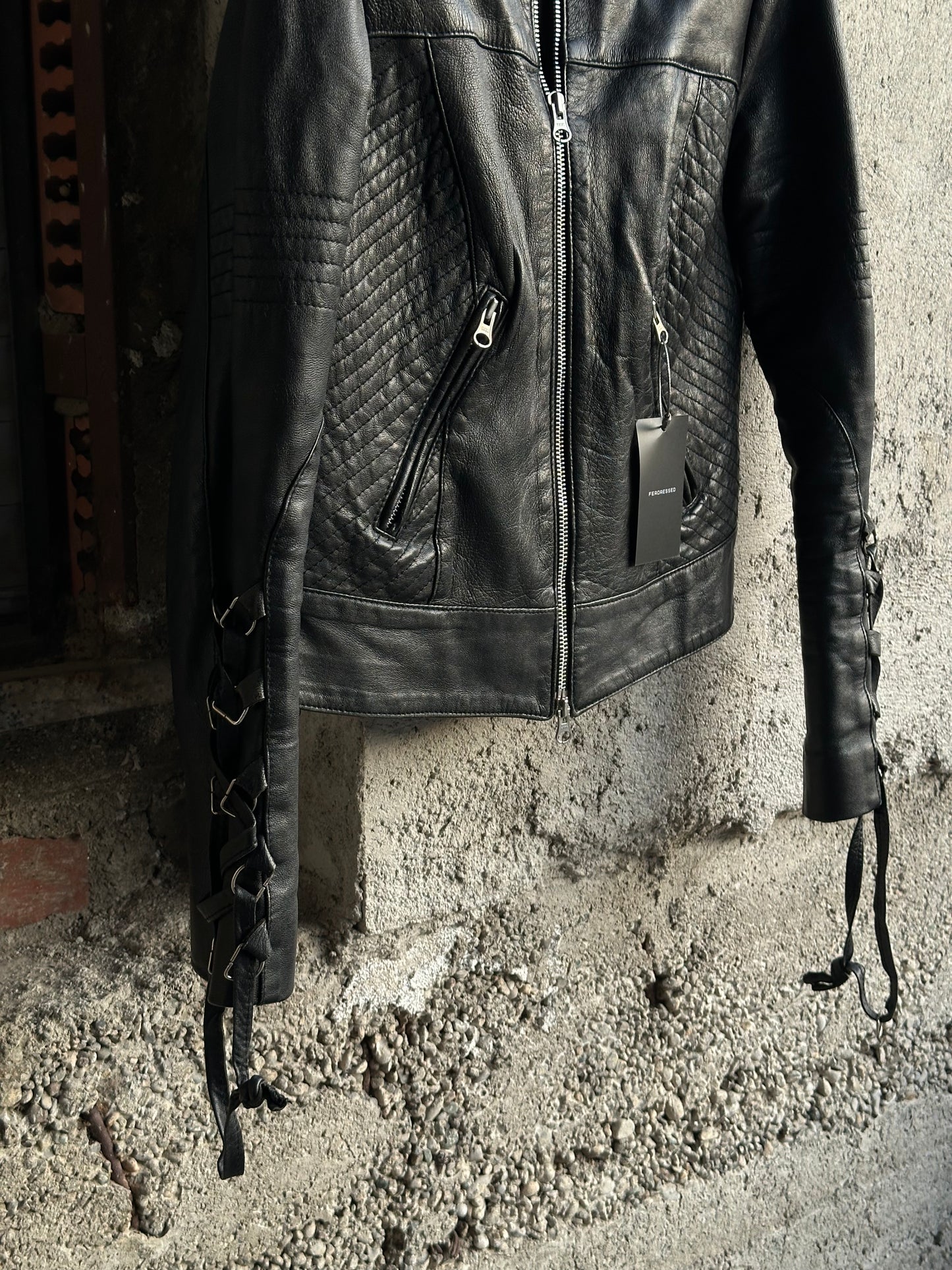 BLACK LEATHER JACKET WITH SLEEVE LACE-UP