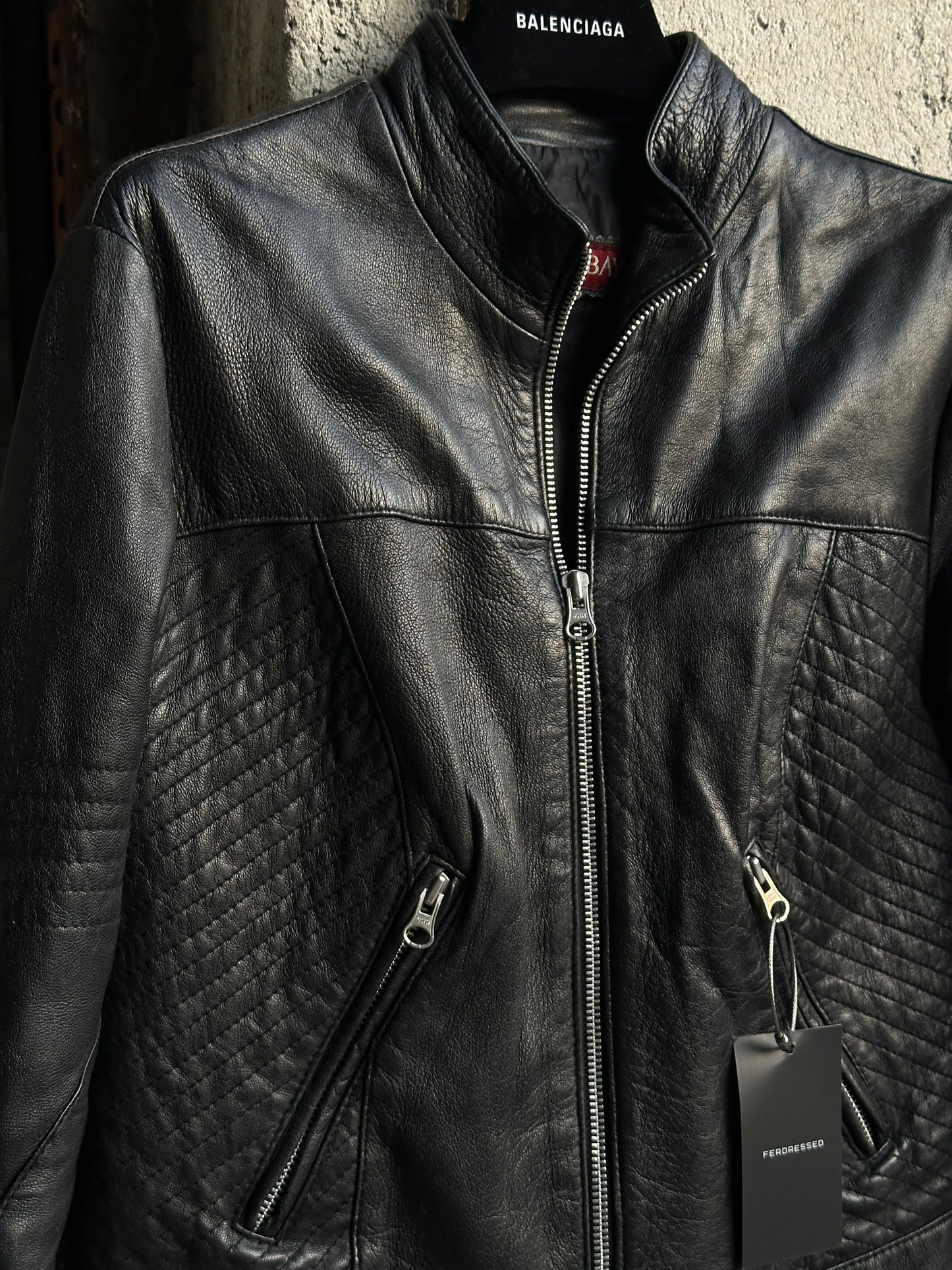 BLACK LEATHER JACKET WITH SLEEVE LACE-UP