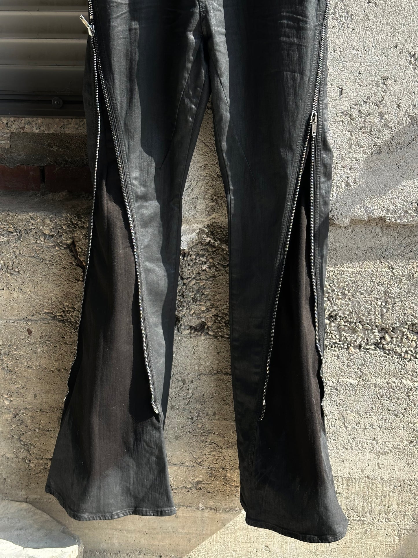 ZIPPED BOLAN WAXED DENIM BLACK PANTS