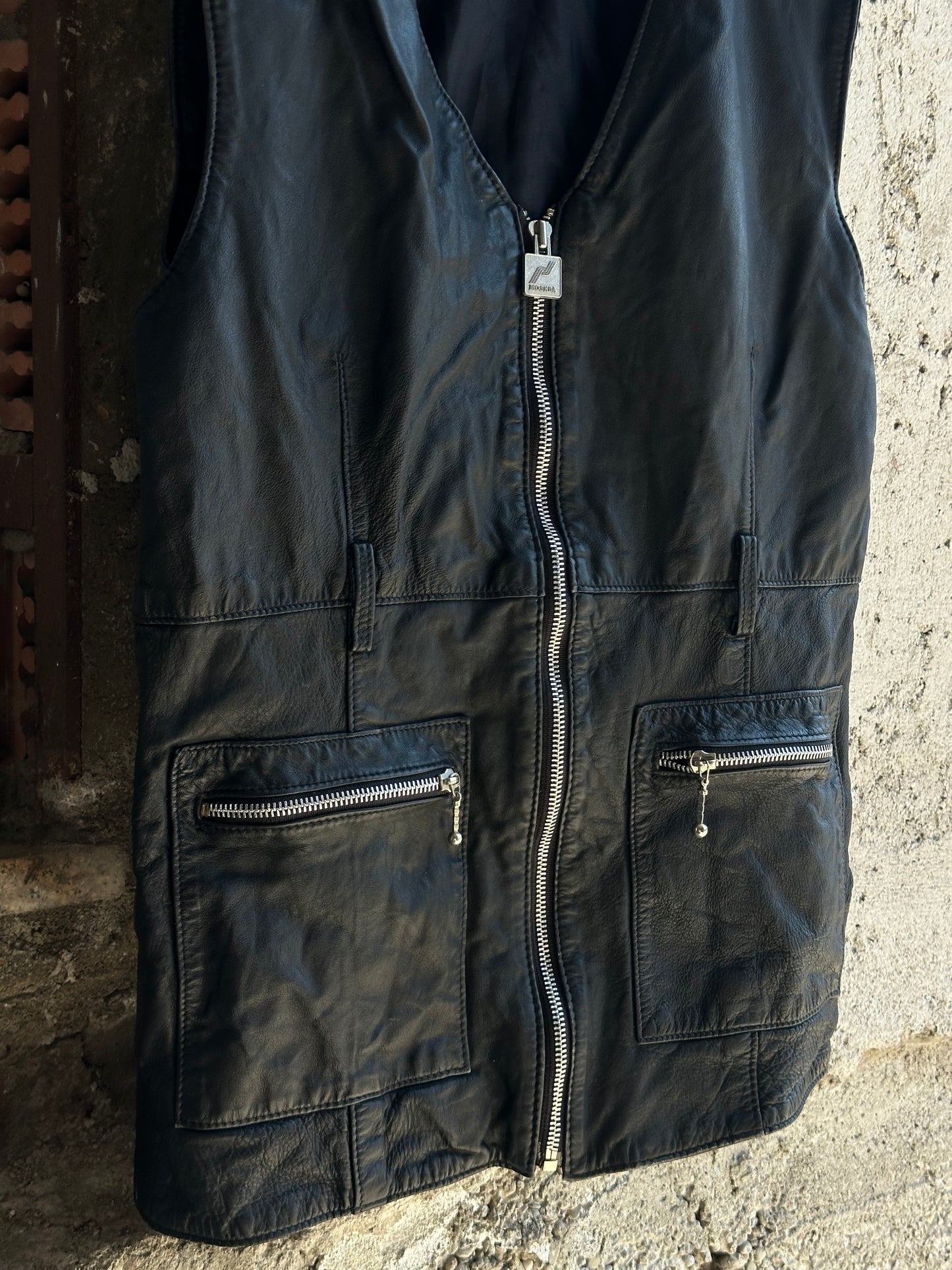 LEATHER BELTED VEST
