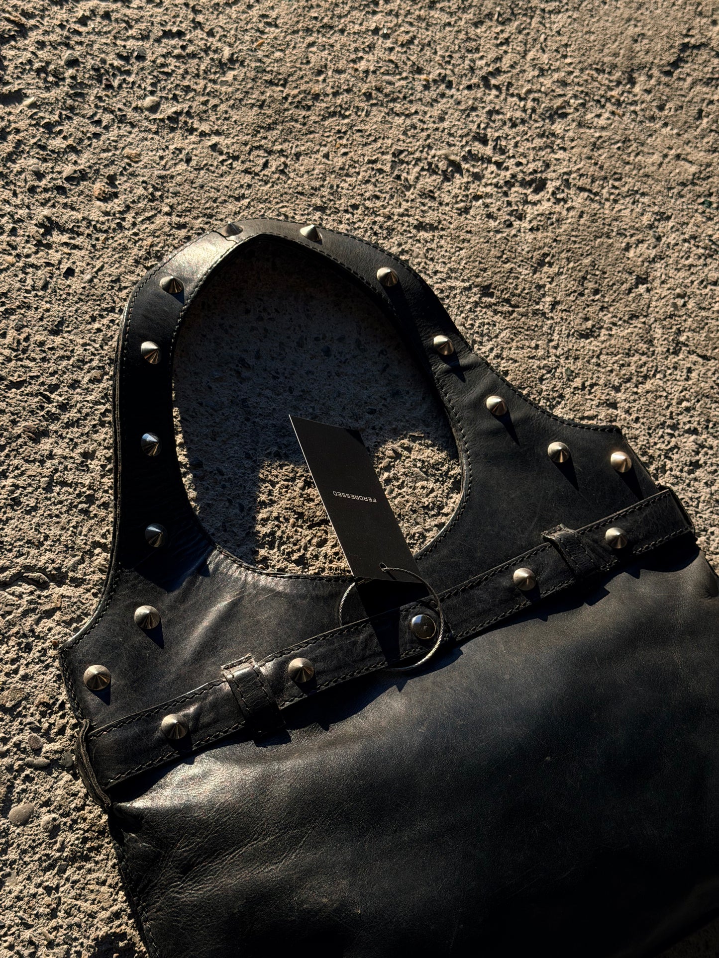 STRUCTURED STUDDED LEATHER BAG