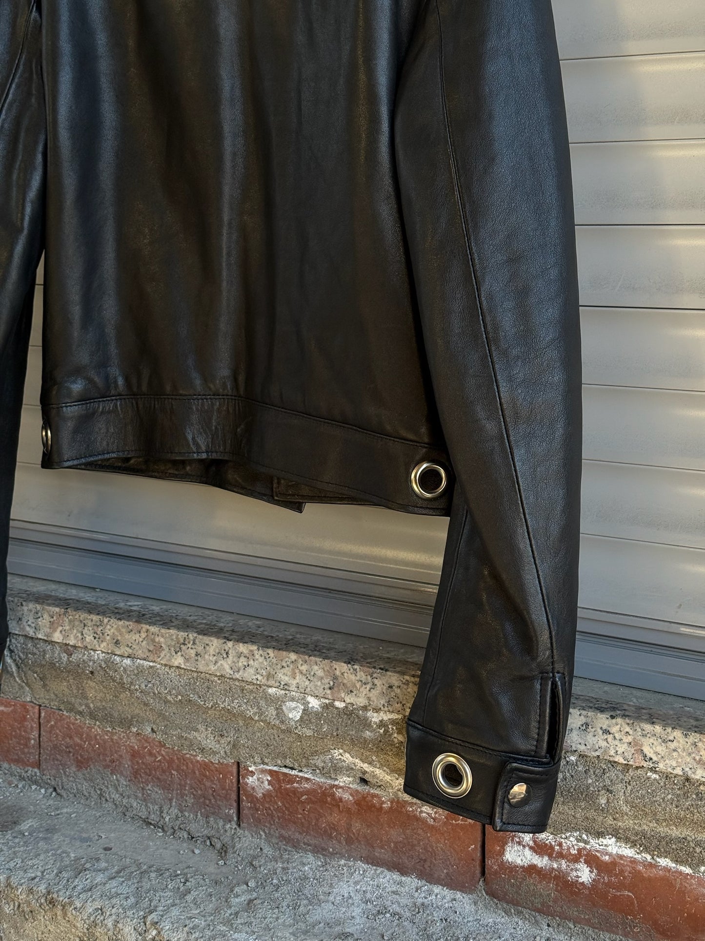 EYELETS BLACK LEATHER JACKET