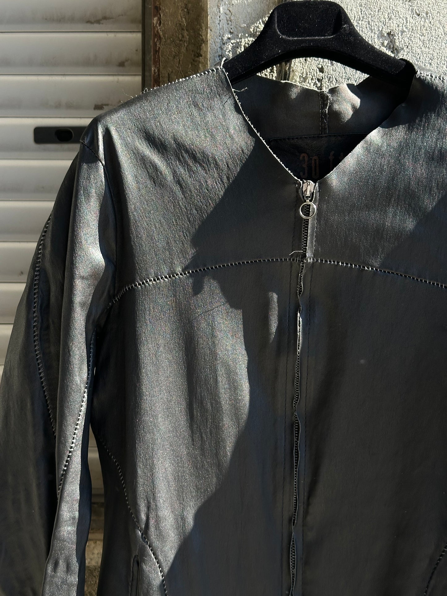 REVERSE STITCHING CROSS LEATHER JACKET