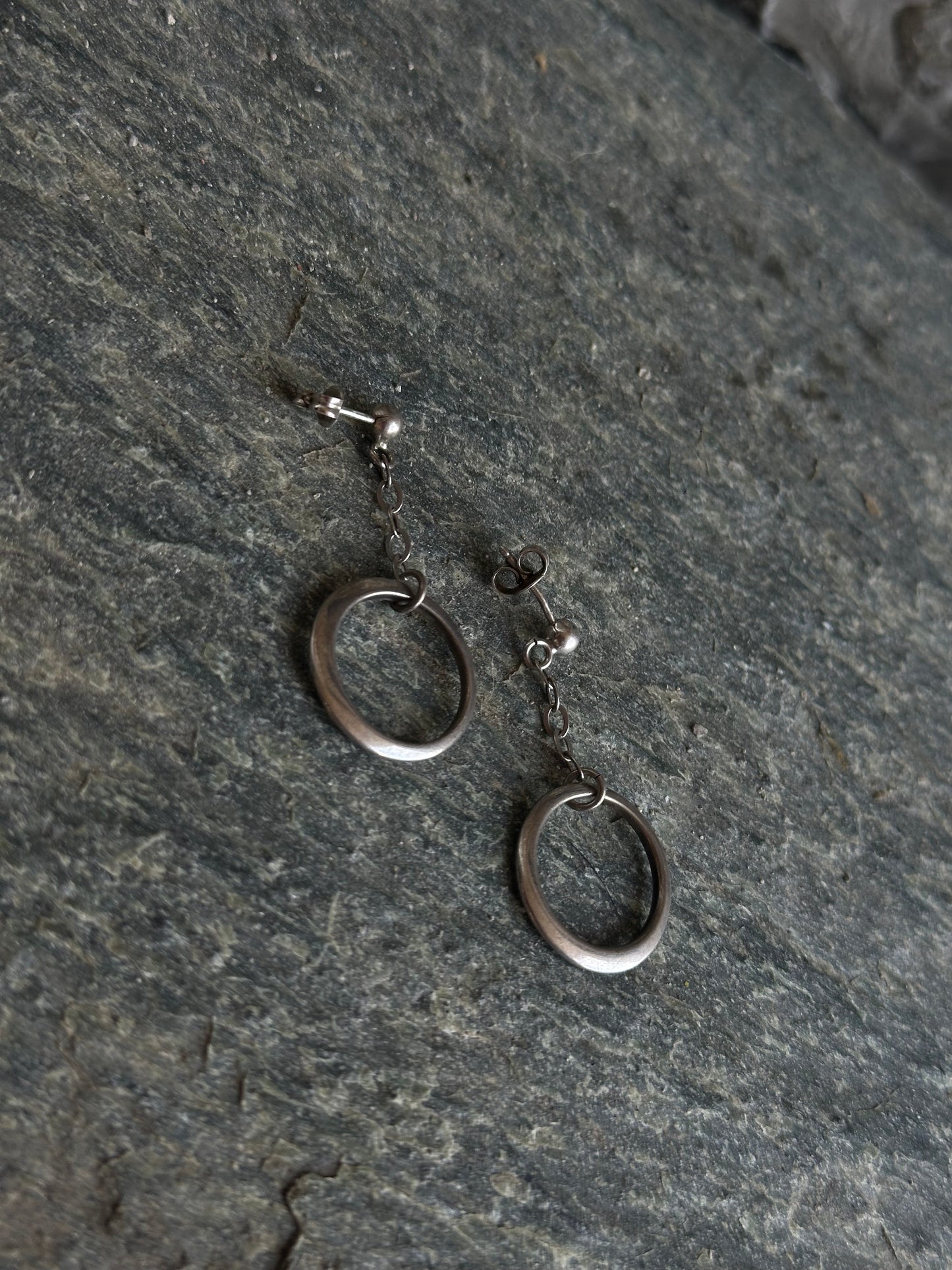 SILVER DANGLING HOOP EARRINGS