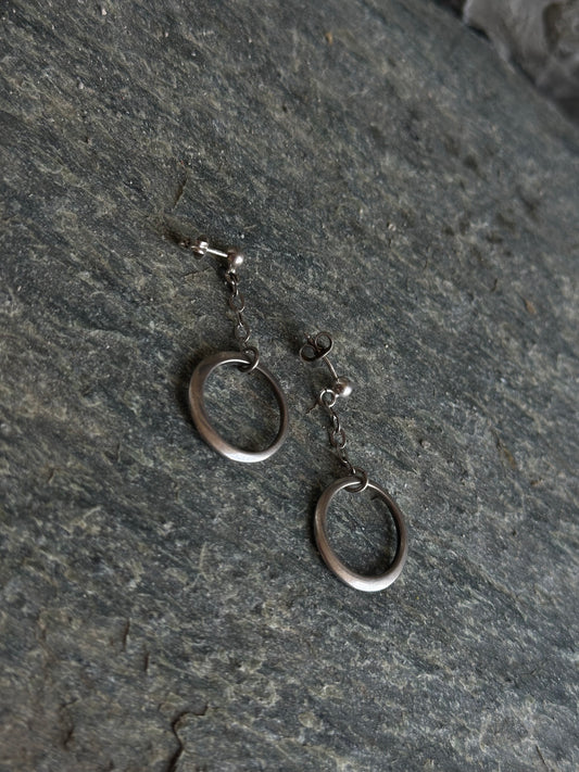 SILVER DANGLING HOOP EARRINGS