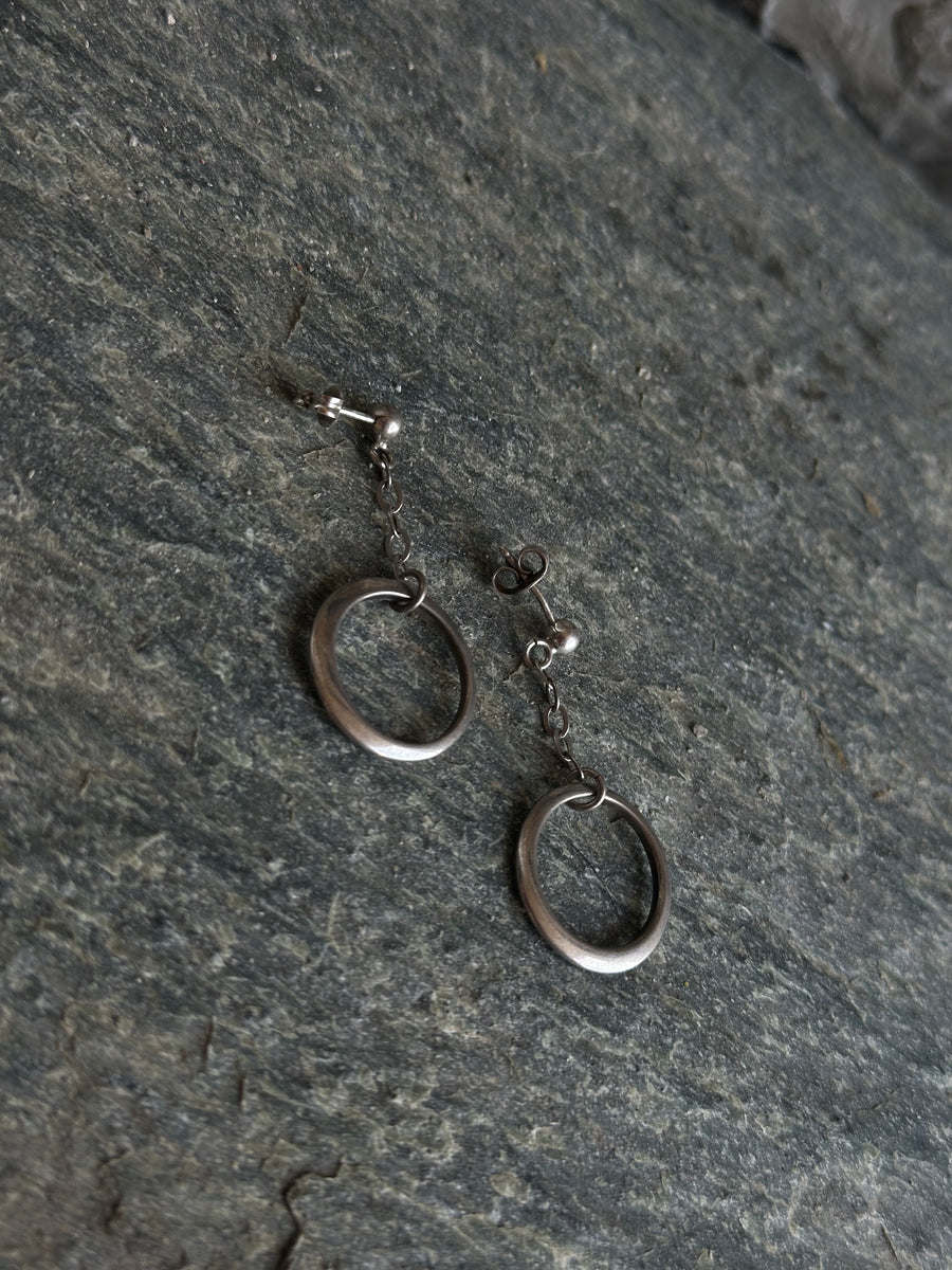 SILVER DANGLING HOOP EARRINGS